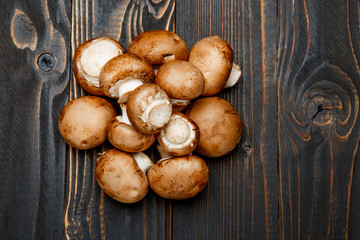 champignon mushroom on wooden background