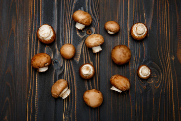 Obraz na płótnie Canvas champignon mushroom on wooden background