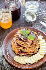 Pancakes with Raspberry Jam and Maple Syrup