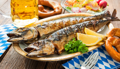 Grilled mackerel fish with beer and pretzel