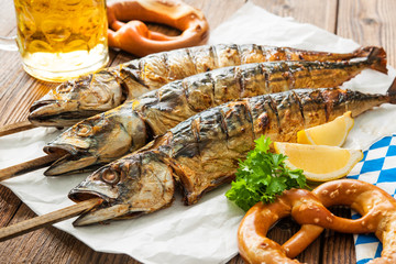 Grilled mackerel fish with beer and pretzel
