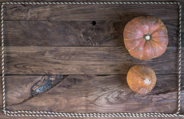 pumpkin, vegetables on a rustic wooden table