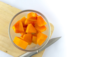 ripe papaya cut into pieces ready to eat, healthy fruit food concept.