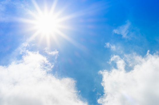 Looking up at Nice blue sky with sun beam and cloudy,Nature back