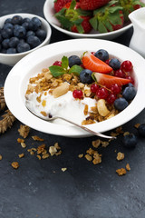 baked muesli with fresh berries and yogurt for breakfast