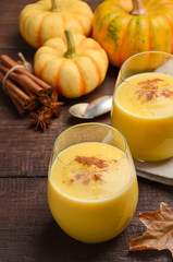 Pumpkin smoothie with spices, selective focus