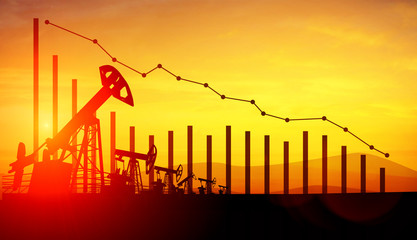 3d illustration of oil pump jacks on sunset sky background with financial analytics. Concept of falling oil prices © artegorov3@gmail
