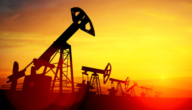 3d illustration of oil pump jacks on sunset background
