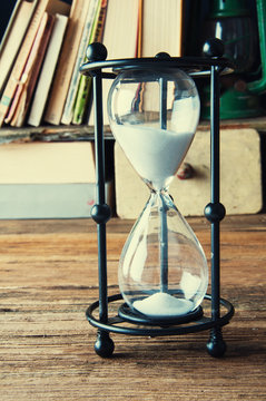 Hourglass in old library