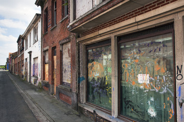 Fototapeta na wymiar Street in ghost town Doel in Belgium