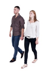 Fototapeta premium Back view going couple in jeans. walking friendly girl and guy holding hands. Rear view people collection. backside view of person. Isolated over white background. 