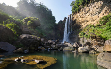 Laxapana Falls is 126 m high and the 8th highest waterfall in Sri Lanka. - obrazy, fototapety, plakaty