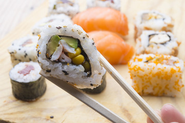 Fresh Homemade Sushi Roll against a background