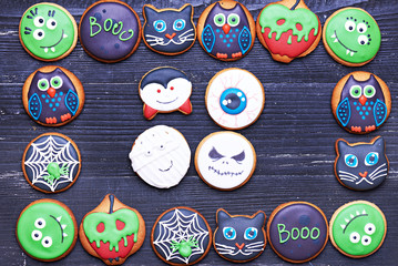 Handmade Halloween cookies on a wooden table