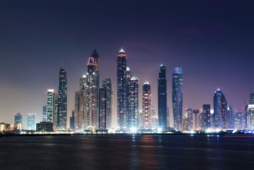 Fototapeta na wymiar panorama of skyscrapers in Dubai Marina, sunset time, UAE