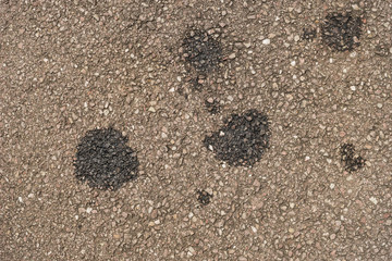 Hintergrund Motorölflecken auf Asphalt - Background motor oil stains on asphalt