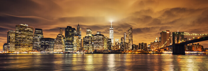 Panele Szklane Podświetlane  Manhattan o zachodzie słońca