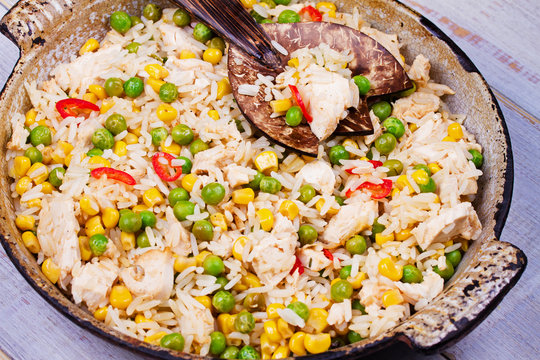 Chicken Breasts with Rice, Peas, Corn and Chili