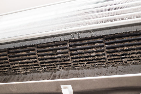 close up grunge dirty dust fungus Air Duct or Air conditioner , Danger and the cause of pneumonia in office man.