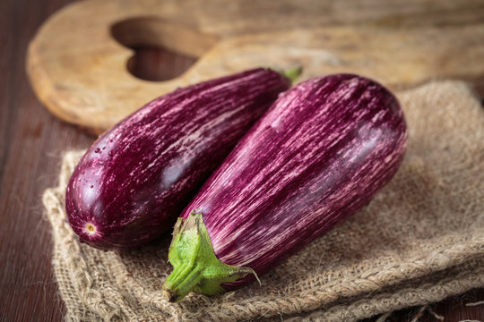 Fresh raw purple eggplants