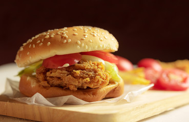 Closeup of home made burgers on wooden background