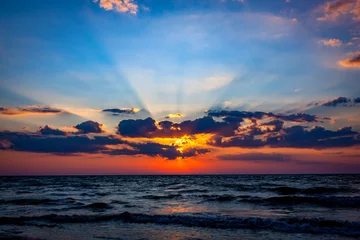 Poster nice sunset sky over sea © Pavlo Klymenko