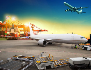 Fototapeta premium air freight and cargo plane loading trading goods in airport con