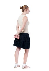 Fototapeta premium back view of standing young blonde woman. Rear view people collection. backside view of person. Isolated over white background.