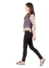 back view of walking woman . going brunette girl in motion. Rear view people collection.  backside view of person. Isolated over white background.
