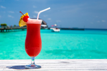 cocktail with blur beach on background