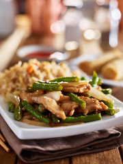 chinese greenbean and chicken stir fry with fried rice