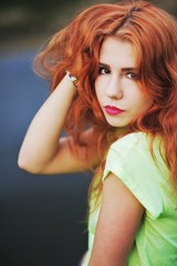 Fototapeta premium Portrait of an adorable brown-eyed girl. The young girl straight