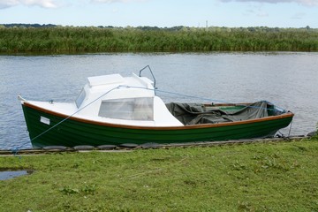 Fototapeta premium Boat on the Norfolk Broads, UK 