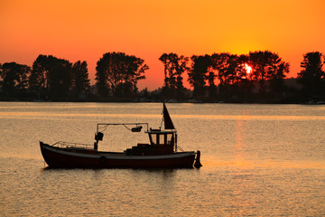 Coastal Sunset, Fishing Boat in the Sea, Rügen Island, Germany