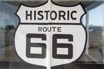 Route 66 sign at an old abandoned gas station in Tucumcari, New Mexico