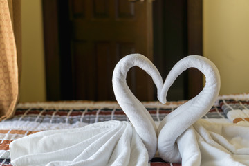 Obraz na płótnie Canvas Hotel prepaerd bed room loke swans for tourism