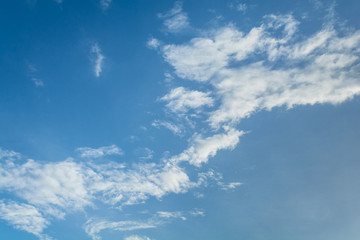 Naklejka na ściany i meble Blue sky with beautiful white clouds in sunny day.