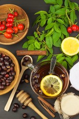 Hot cup of rosehip tea. Traditional treatment of colds and flu. Medicinal plants.
