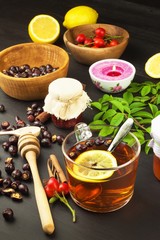 Hot cup of rosehip tea. Traditional treatment of colds and flu. Medicinal plants.
