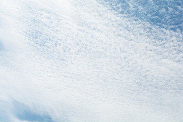 Blue sky with beautiful white clouds in sunny day.