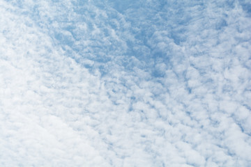 Blue sky with beautiful white clouds in sunny day.