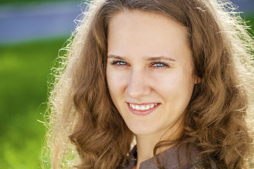 Portrait of beautiful young happy woman