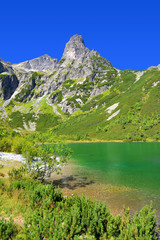 Naklejka na ściany i meble Beautiful summer landscape. Mountain lake Zelene pleso in National Park High Tatra. Slovakia, Europe.