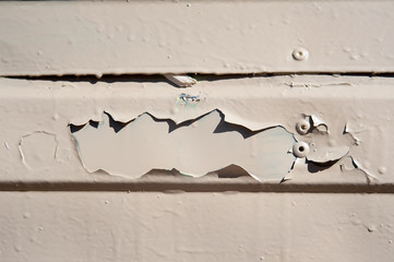 chipped metal plating on scratched wall , industrial grunge background