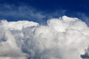 high cumulus clouds on a blue sky