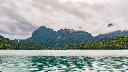 Fototapeta premium Beautiful view of water and mountain at Ratchaprapha dam, Surat