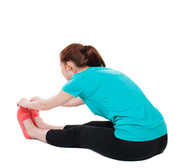 Fototapeta premium back view of standing young beautiful woman in sport dress involved in Pilates. Rear view people collection. backside view of person. Isolated over white background. Sport girl in black tights