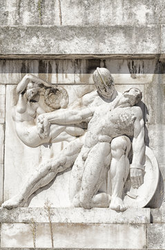 Bas-relief and sculpture of ancient Roman soldiers with war scenes, Carrara marble
