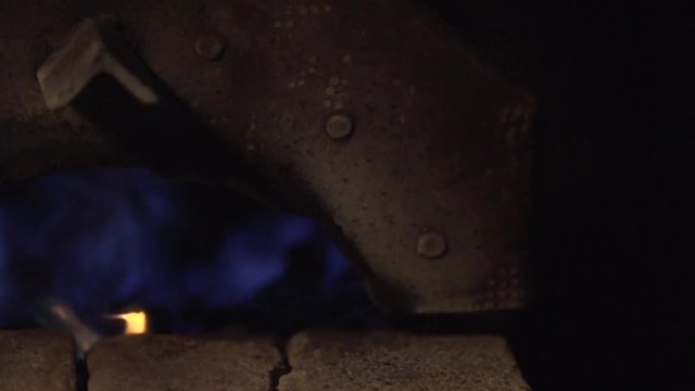 Blacksmith oven preparing to light fire