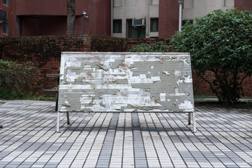 Large blank billboard on a street wall, banners with room to add your own text